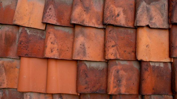 Roof Repair vs Replacement - Tiles